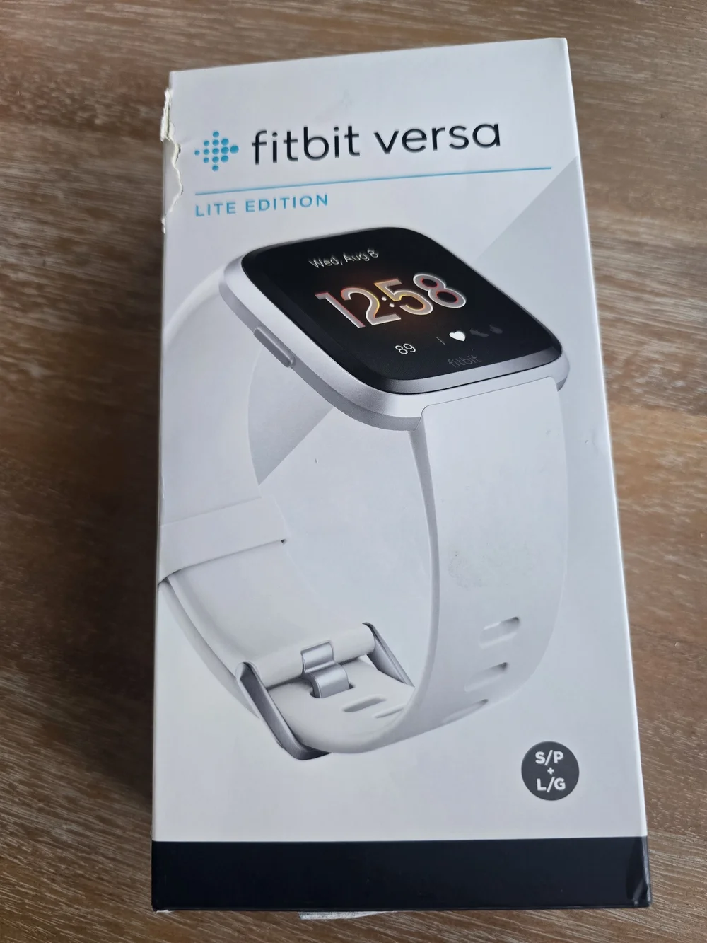 Fitbit Versa Lite Edition White and Silver Smartwatch with Touchscreen, Women's